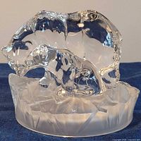 Front view of clear crystal bear and cub on ice base