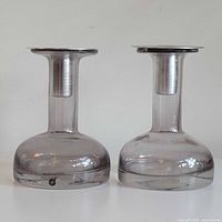 Front view of both Sagaform Pava glass pieces standing upright with inserts fitted