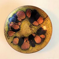 Top view of enamel dish showing crackle and abstract pattern