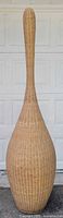 full front view of tall wicker lamp body