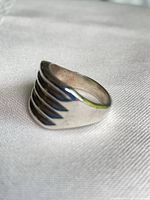 Side view showing ridged design and taper of sterling silver ring