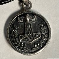 Front view of sterling silver Mjölnir pendant