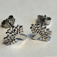 Front view of both Tree of Life studs with butterfly backs attached