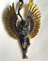 Full view of pendant showing winged panther design