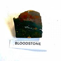 Front view of bloodstone showing colors and polished surface