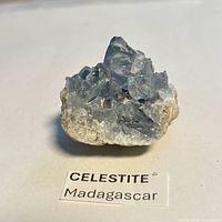 Front view of celestite crystal cluster with matrix