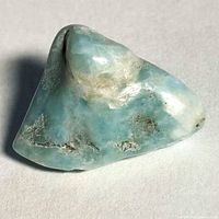 Close view of larimar stone showing color and inclusions