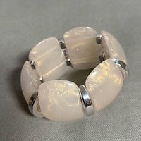 overall view of stretch bracelet showing pearlized beads and spacers