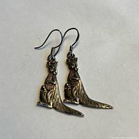 Full view of both earrings showing design and hooks