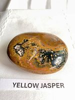 Top view of polished yellow jasper showing color pattern