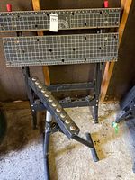 adjustable workbench with roller stand front view