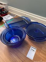 overview showing rectangular baking dish, three nested bowls, casserole base