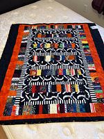 Full view of quilt front showing overall pattern and size