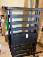 headboard and footboard showing curved slat design