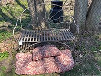 full view of bench with cushions on ground