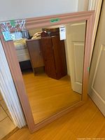 Front view of mirror showing full frame and glass