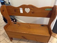 Front view showing heart cutout, hinges, overall style