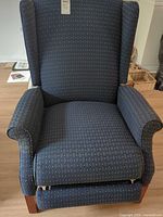 front view of navy patterned wingback recliner armchair