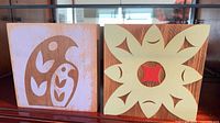 Front view of both painted wood blocks side by side