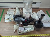 Group shot showing all appliances, utensils, and manuals