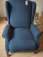 Front view of wingback armchair