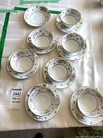 Top view of all cups and saucers on table