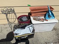 Group view of planters, stand, tools, tote and soil bags