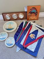 Overview of flags, instrument panel, award plaque, three round plaques