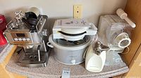 Group shot of all five countertop appliances on counter
