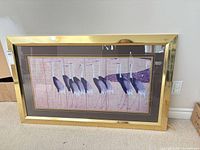 Front view of framed crane print