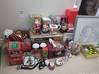 Group shot showing majority of holiday items, tree box, figurines, ceramics and ornaments