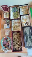 Overview of entire lot in boxes on tabletop