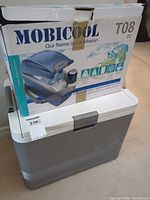 Both coolers: Mobicool T08 boxed sitting on KoolMate 40 chest