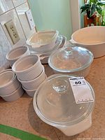 Group view of ramekins, casseroles, lids