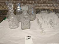 group view of decanters, pitcher, shaker, glass set