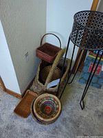 Group showing plant stand and stacked baskets