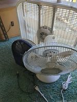 Square box fan, table fan and desk fan showing cords