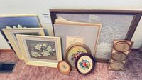 Group shot of all framed pieces leaning against wall