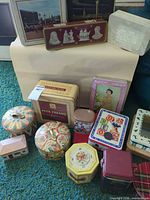 Group shot of assorted tins showing variety of shapes and designs