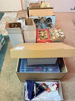 Multiple boxes containing vintage Shiny Brite and other ornaments