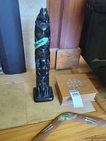 Full view of totem, boomerang, decorative box