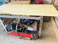Full view of table showing frosted glass top and chrome legs