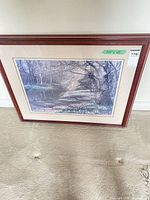 Front view of framed landscape print showing entire artwork and frame