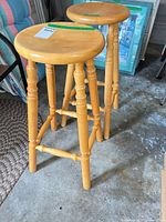 Full view of both solid pine bar stools