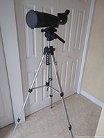 Full view of spotting scope on tripod