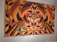 Full view of wool tapestry hanging on wall