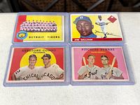 Four vintage Topps cards in protective sleeves: Detroit Tigers team card, Jim Gilliam, Fox & Aparicio Keystone Combo, Kaline & Maxwell Pitchers Beware