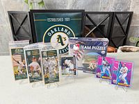 Group shot of all eight Oakland Athletics items displayed