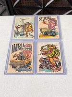 All four Odd Rods-style cards in sleeves