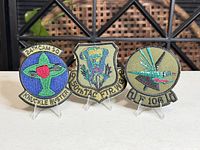 Front view of all three Air Force patches on stands